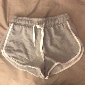 Grey sports shorts.